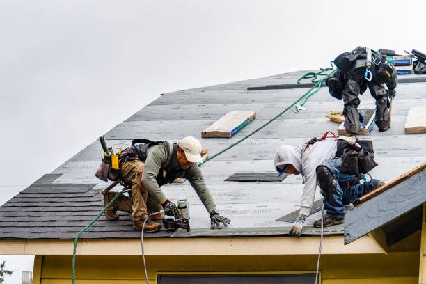 Professional Gutter Installation technician working in Chelsea, OK